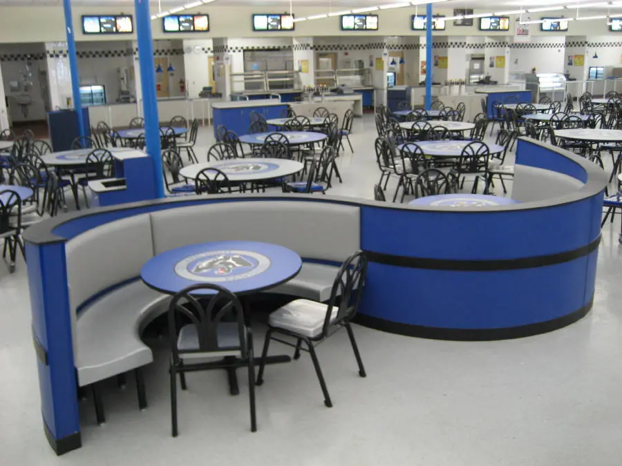 Serpentine booth in school colors, black, grey, and blue.